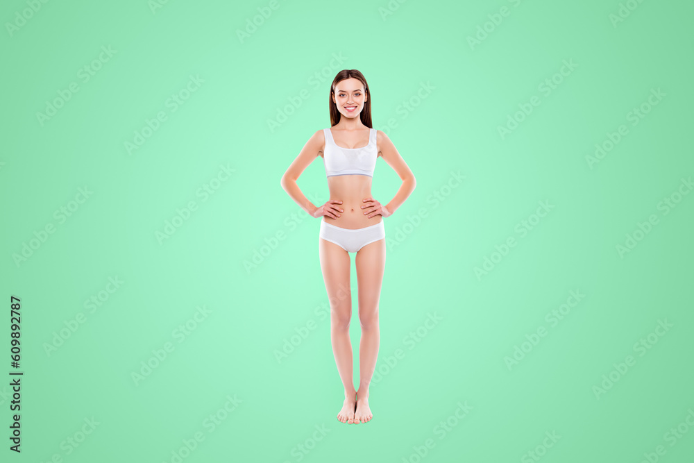 Fullbody portrait of thin slender woman in cotton underwear bikini bra demonstrate ideal body isolated on white background. Enhancement concept Fullbody portrait of thin slender woman in cotton underwear bikini bra demonstrate ideal body isolated on white background. Enhancement concept