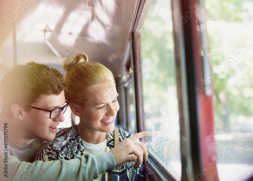 Couple drawing on bus window