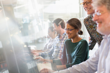 Students at computers in adult education classroom