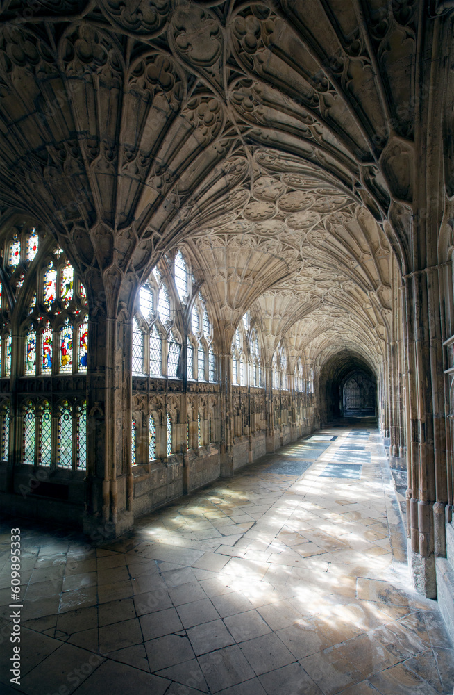 Cloisters of the Romanesque gothic Gloucester cathedral with Fan vaulted ceiling, used extensively as location for the Harry Potter film series