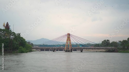 Ganges or Ganga river flowing at Har ki pauri in hindu pilgrimage city of Haridwar Uttrakhand of North India photo