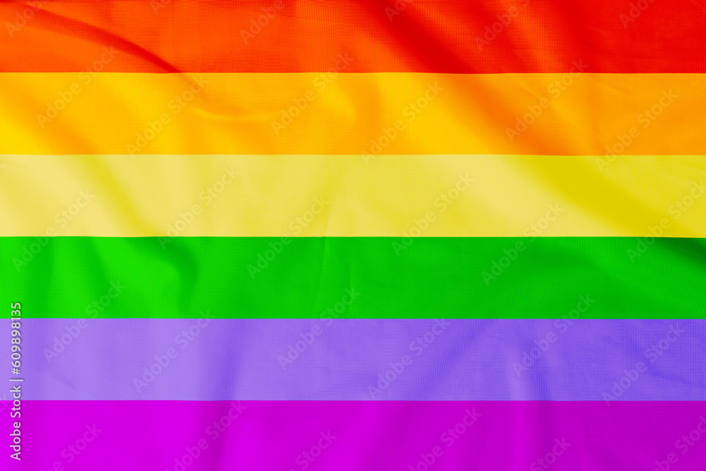 Flag of LGBT community with natural material creases as a background