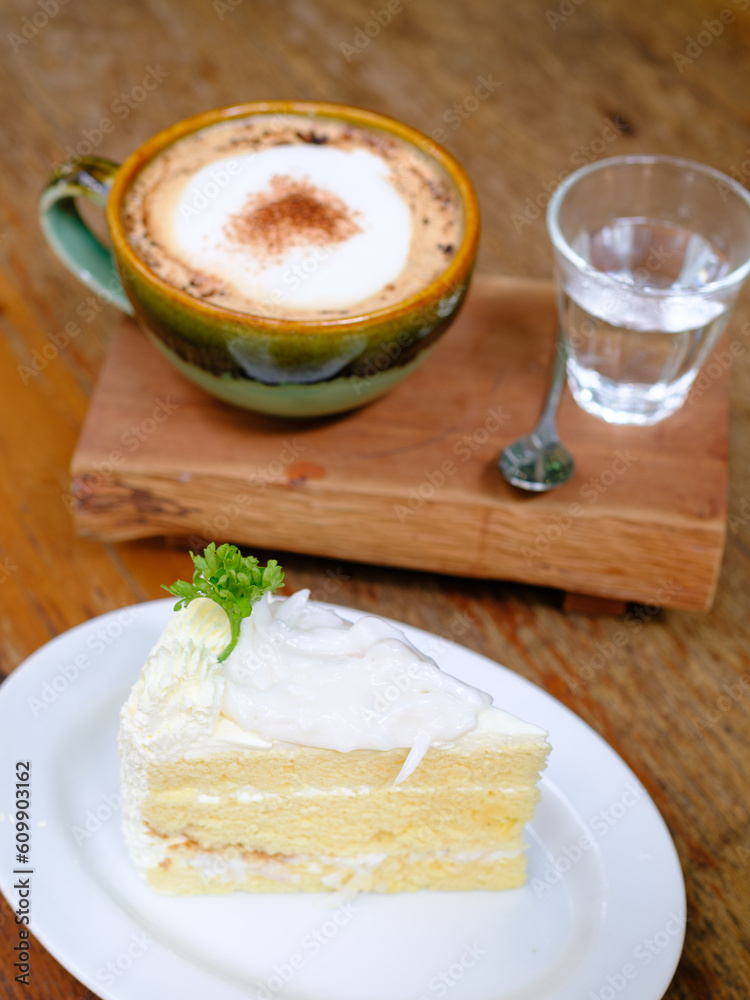 coconut cake and hot mocha on the table coconut cake and hot mocha on the table