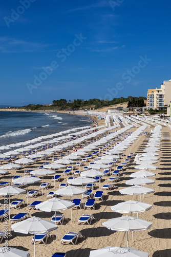 Beach with umbrellas in sea resort on Black Sea
