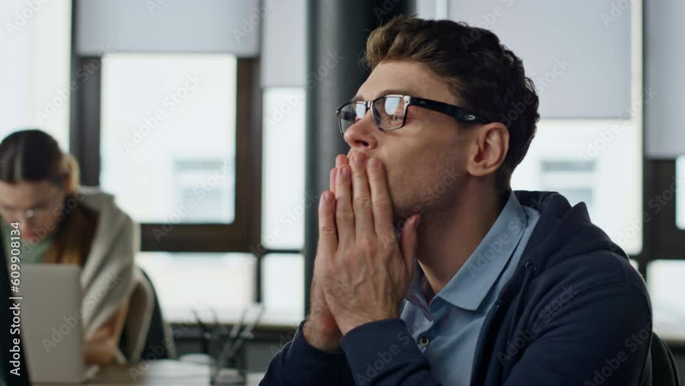 Closeup tired manager analyzing online data. Stressed man overwork solve problem Closeup tired manager analyzing online data. Stressed man overwork solve problem