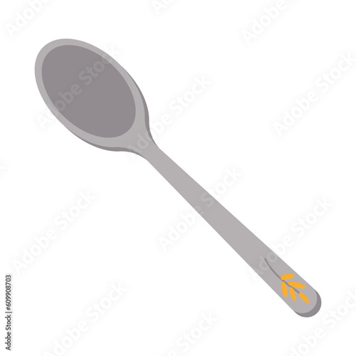Dishes. A teaspoon with a floral ornament on the handle.