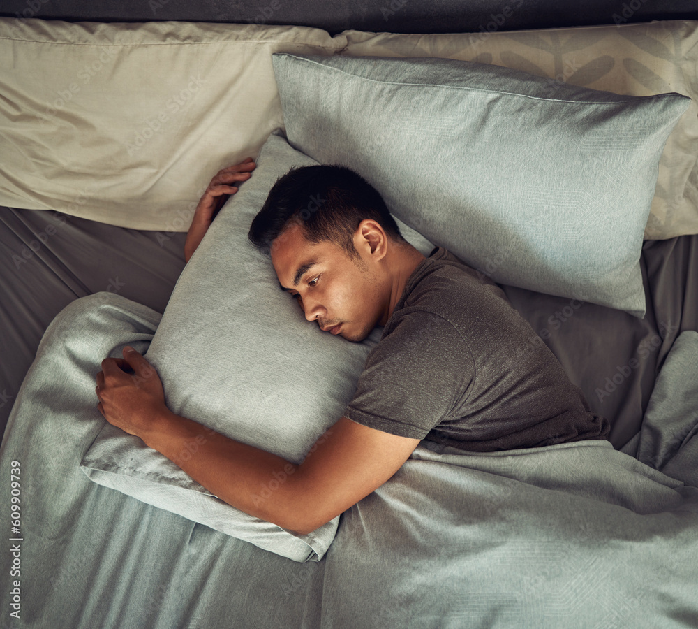 Sad, tired and depression with man in bedroom for burnout, fatigue and mental health. Anxiety, lonely and depressed with male person feeling grief in bed at home for frustrated, problem and morning Sad, tired and depression with man in bedroom for burnout, fatigue and mental health. Anxiety, lonely and depressed with male person feeling grief in bed at home for frustrated, problem and morning