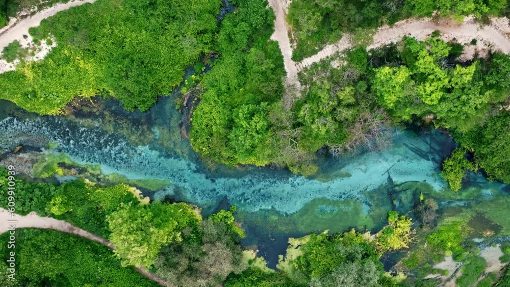 Aerial rising over Blue eye spring a natural phenomenon in Albania Aerial rising over Blue eye spring a natural phenomenon in Albania