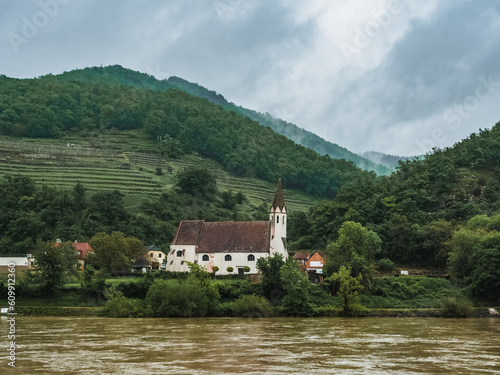 Church on the banks of the Danube in the Wachau Valley, Austria. Beautiful church on the river