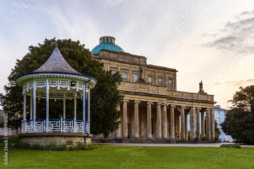 Pittville Pump Room and old spa mineral water buildings in Pittville Park, Cheltenham, Gloucestershire, England photo