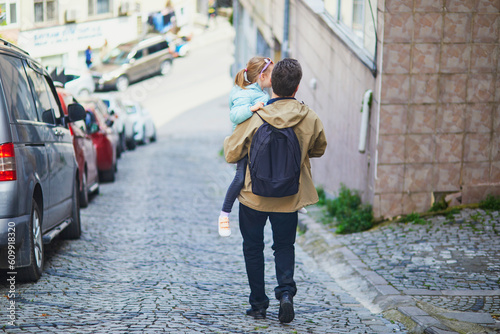 Father and daughter walking together in Uskudar district on Asian side of Istanbul, Turkey