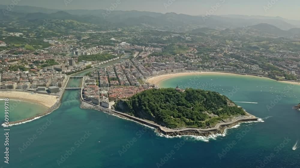 breathtaking Aerial view of Motako Gaztelua on the green covered hillside in San Sebastian breathtaking Aerial view of Motako Gaztelua on the green covered hillside in San Sebastian