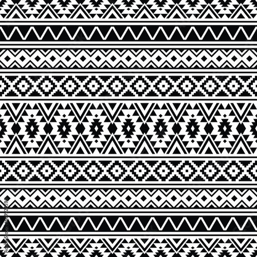 Geometric seamless pattern in black and white colors. Aztec tribal design. Abstract ethnic background with folk motives. Design for textile, fabric, clothes, curtain, carpet, ornament, wallpaper.