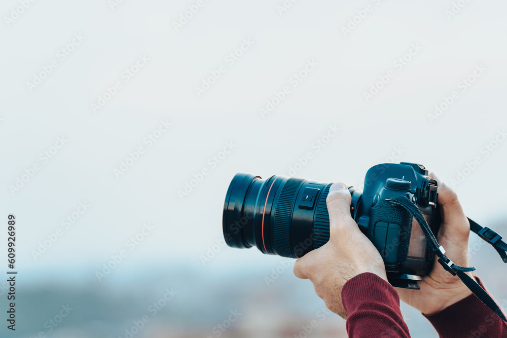 Man holding a camera Man holding a camera