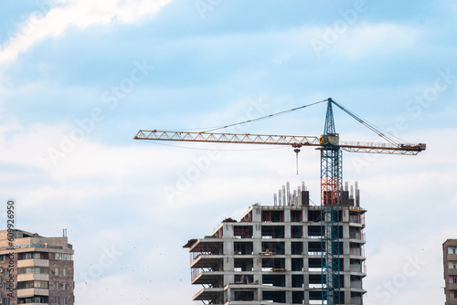 Construction of a new skyscraper and a crane
