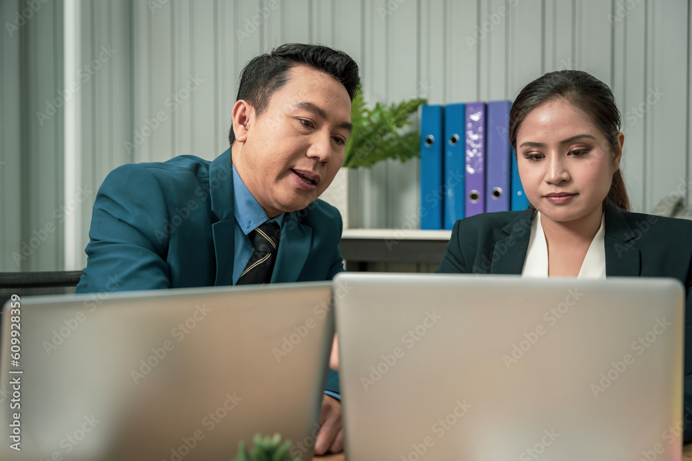 Modern Asian businessman with high confidence Committed to working together as a harmonious team Having a professional planning meeting at the company Modern Asian businessman with high confidence Committed to working together as a harmonious team Having a professional planning meeting at the company