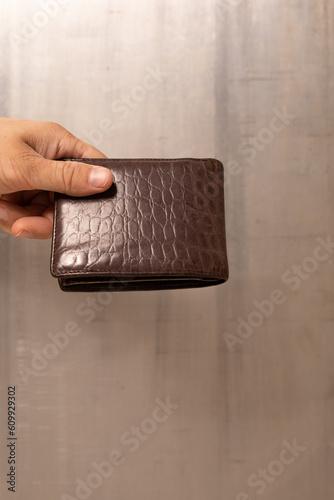 Man hand open an empty wall...