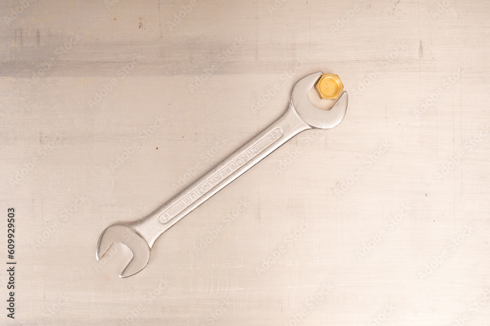 Wrench in hand closeup on white background Wrench in hand closeup on white background