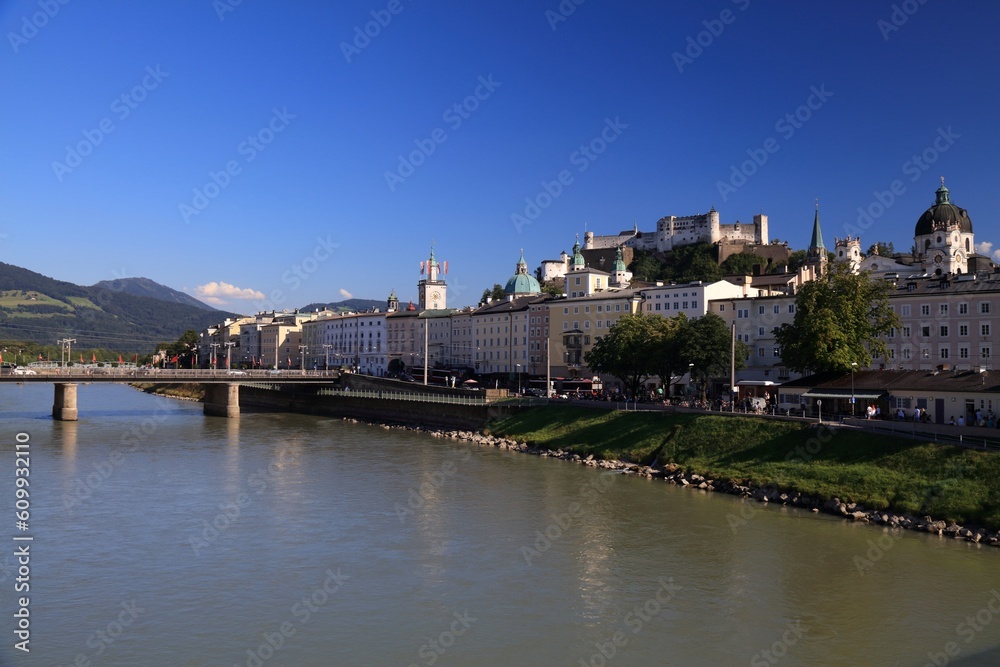 Salzburg, Austria. Summer city view with Hohensalzburg Fortress, other landmarks and river Salzach