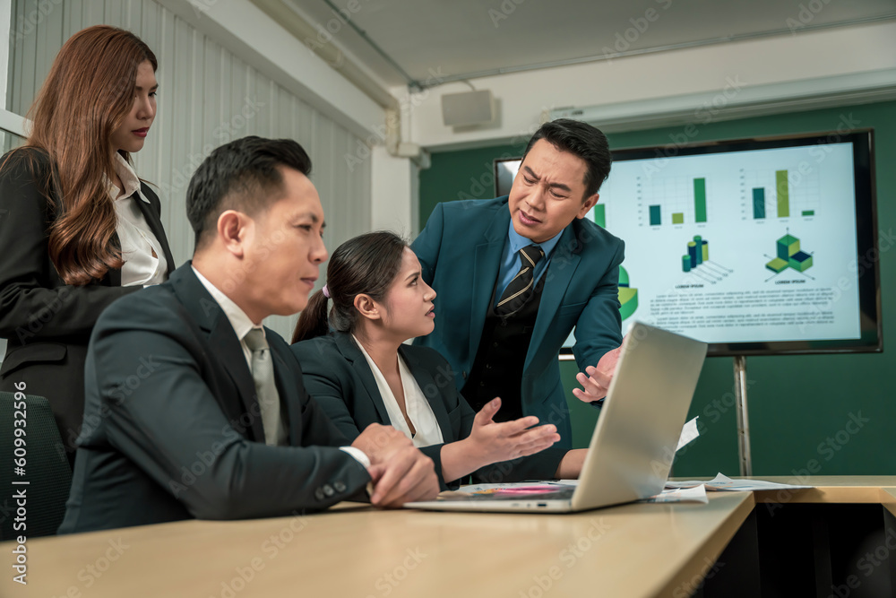 Modern Asian businessman with high confidence Committed to working together as a harmonious team Having a professional planning meeting at the company Modern Asian businessman with high confidence Committed to working together as a harmonious team Having a professional planning meeting at the company