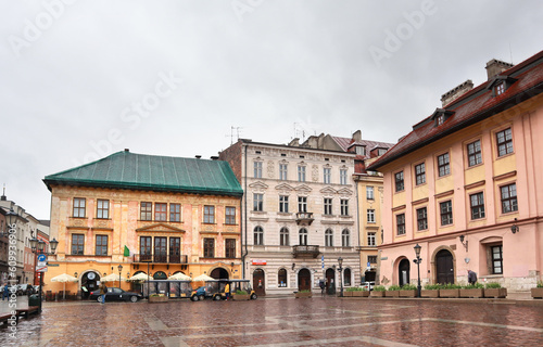 Vintage houses at Square Small Market (Maly Rynek) in downtown in Krakow, Poland