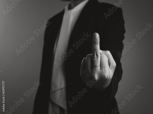 Fotografie Business Woman giving middle finger hand sign
