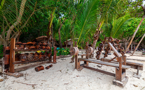 Beach gym with wooden gym equipment outside on the beach