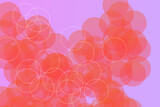 abstract background with circles in pink, orange and purple colors.