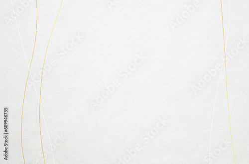 Elegant and modern patterned Japanese washi paper background. Japanese paper texture with golden abstract wave patterns.