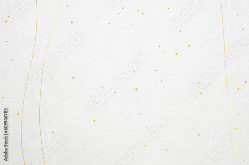 Elegant and modern patterned Japanese washi paper background. Japanese paper texture with golden abstract waves and snow patterns.