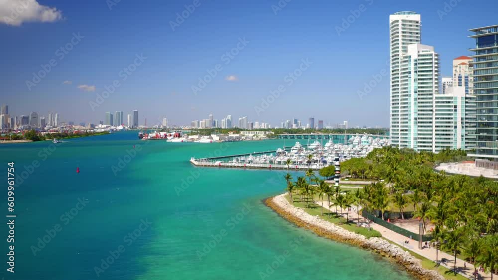 Aerial Shot Of Harbor Near Modern Buildings In City Against Sky On Sunny Day - Miami, Florida Aerial Shot Of Harbor Near Modern Buildings In City Against Sky On Sunny Day - Miami, Florida