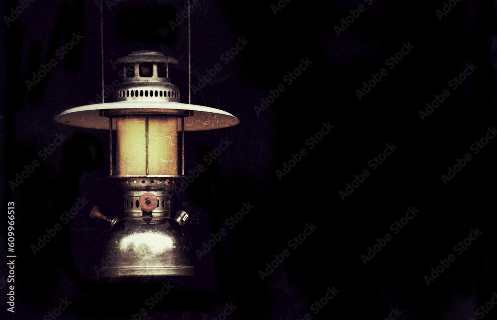 old storm lantern in the dark background vintage style