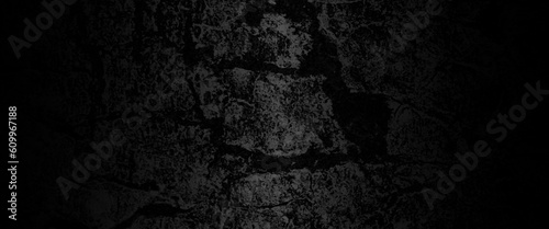 Black wall grunge background. Dark gray cement wall background, scary black grunge goth design. horror black background, Slightly light black concrete cement texture for background. 