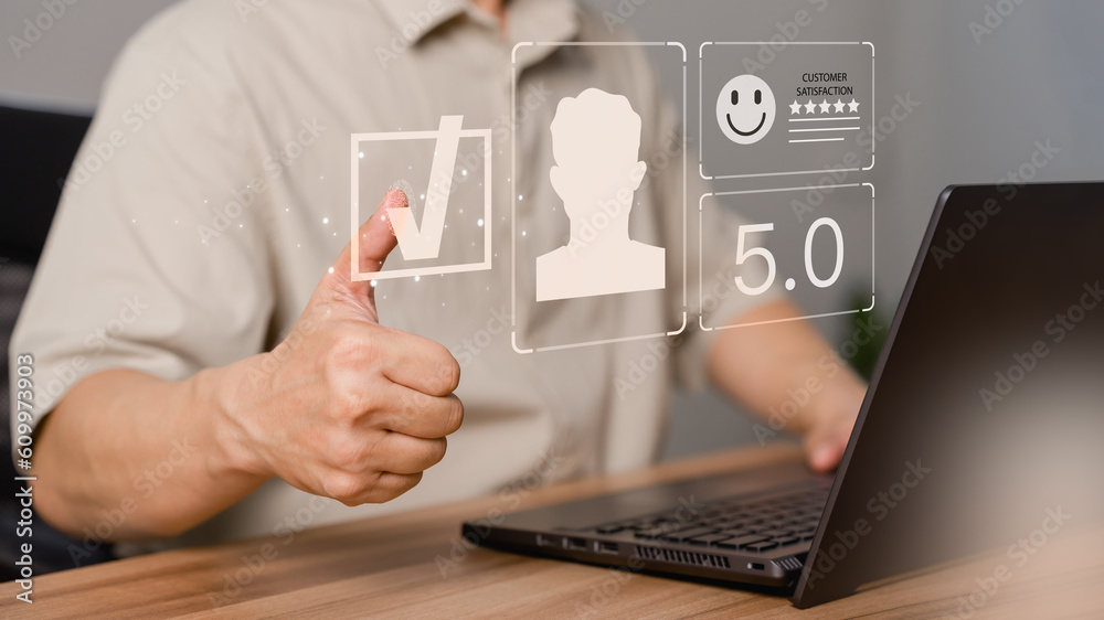 Customer man are touching the virtual screen on the happy smile face icon to give satisfaction in service. Opinion rating very impressed. Assessment testimonial customer service and feedback concept. Customer man are touching the virtual screen on the happy smile face icon to give satisfaction in service. Opinion rating very impressed. Assessment testimonial customer service and feedback concept.