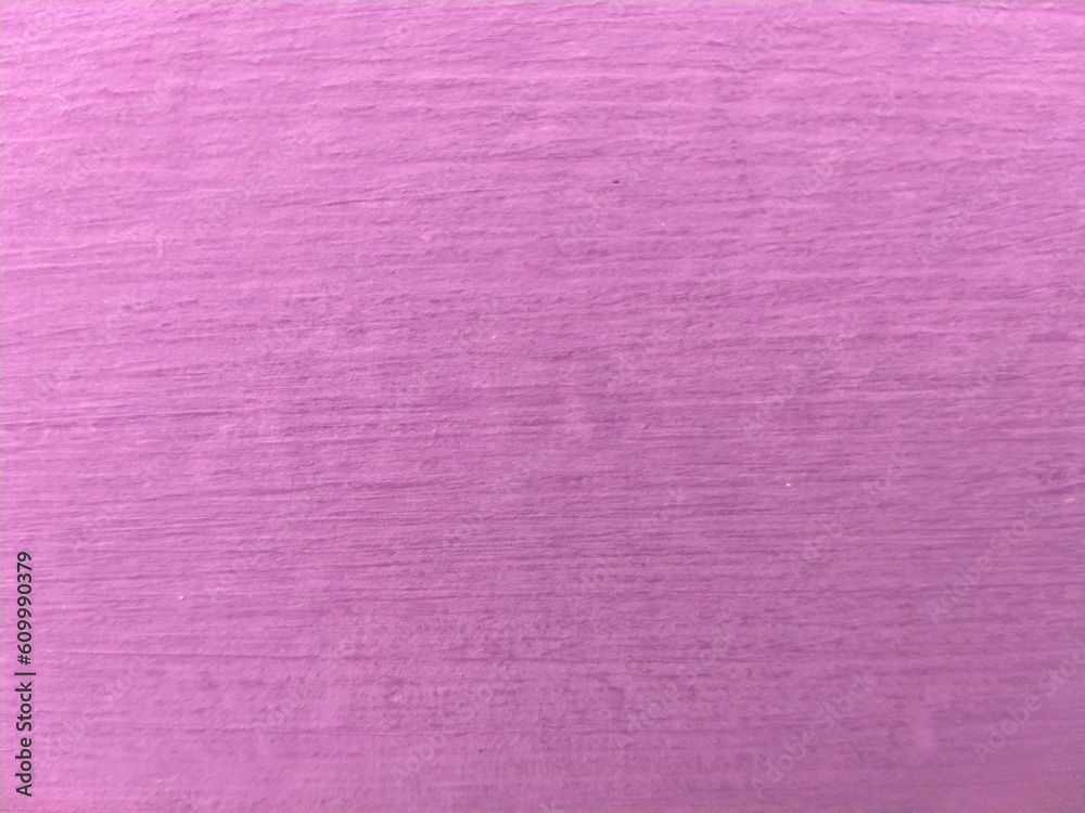 Fototapeta premium The texture of the wood is painted purple.