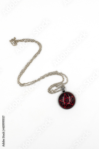 Beautiful decoration pendant with the image of a pentagram