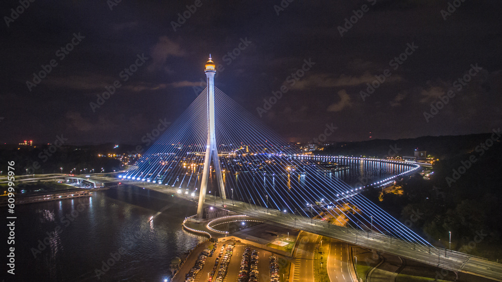 aerial view of Sungai Kebun Bridge with the water village at Bandar Seri Begawan, Brunei Darussalam. night shot