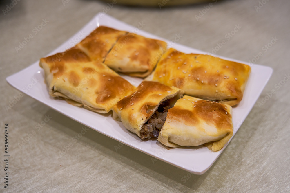 A delicious Chinese Xinjiang dish, baked buns A delicious Chinese Xinjiang dish, baked buns