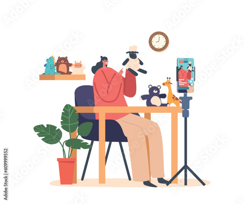 Streamer Perform Handmade Toys Sitting at Table with Smartphone on Holder, Recording Video Tutorials and Master Classes