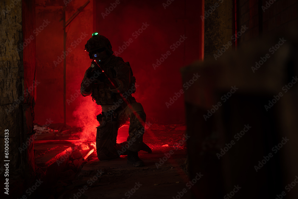 Soldier in anti-terrorist warfare in a dark building, Anti-terrorist operation training on the battlefield