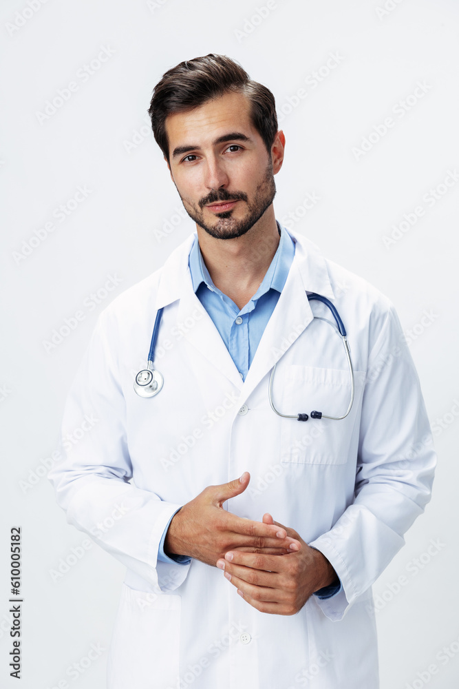 Man doctor in a white coat with a stethoscope smile with teeth and good test results looking into the camera on a white isolated background, copy space, space for text, health Man doctor in a white coat with a stethoscope smile with teeth and good test results looking into the camera on a white isolated background, copy space, space for text, health