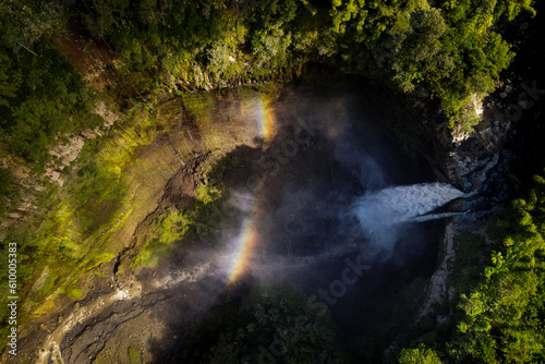 Aerial drone view of Coban Sriti waterfall in rainforest at Lumajang, Indonesia