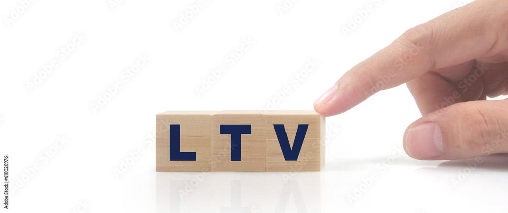 Wooden cube in hand with the letter from the mvp word Wooden cube in hand with the letter from the mvp word