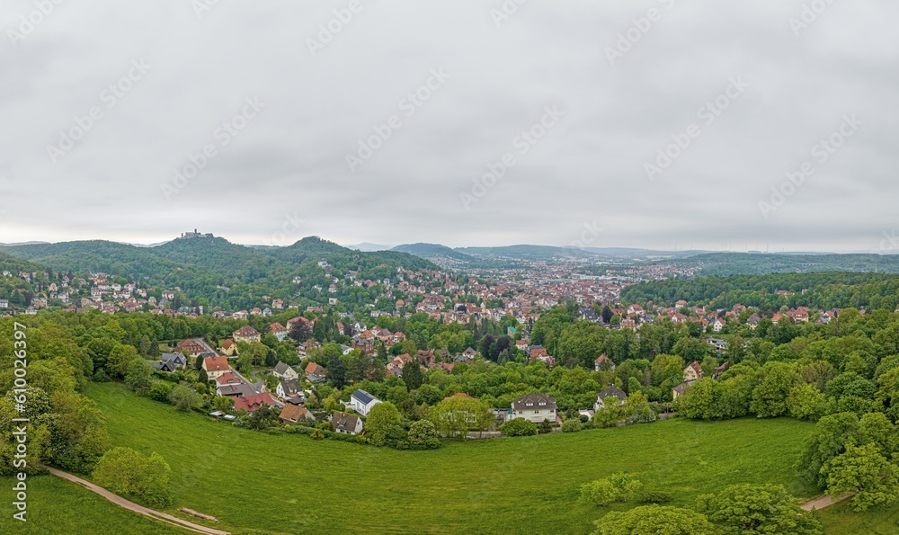 Drone panorama of thuringian city Eisenach with Wartburg castle during daytime