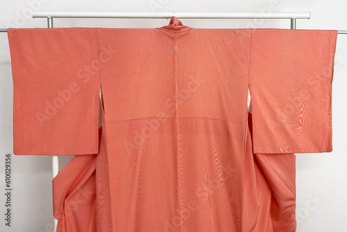 Japanese vintage kimono robe on a hanger, promo photo for an online women's clothing store