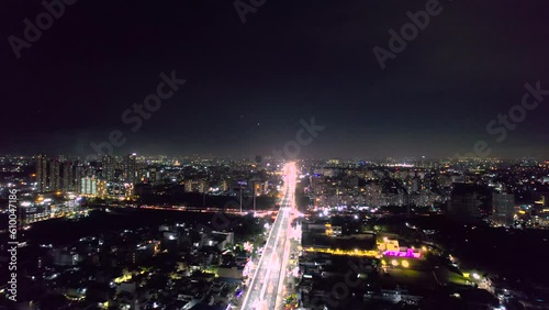 Wallpaper Mural aerial drone panning shot flying over fast moving traffic on sohna road express elevated highway set between skyscrapers and small buildings crossing gurgaon Torontodigital.ca