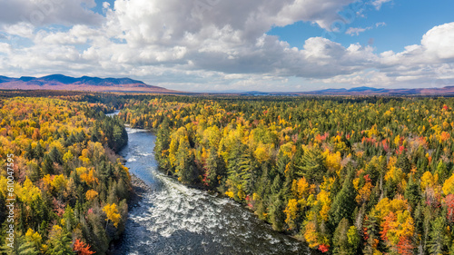 Autumn colors East outlet river to Moosehead Lake  Maine