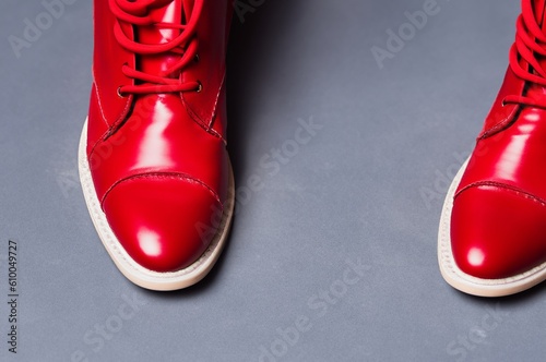 red shoes on grey ground