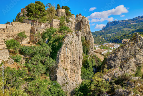 Guadalest Castle on top of a rock with a bright blue sky © Anna Baranova