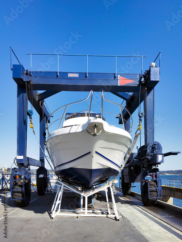 motorboat yacht  in shipyard  for repair and maintenance in marina port